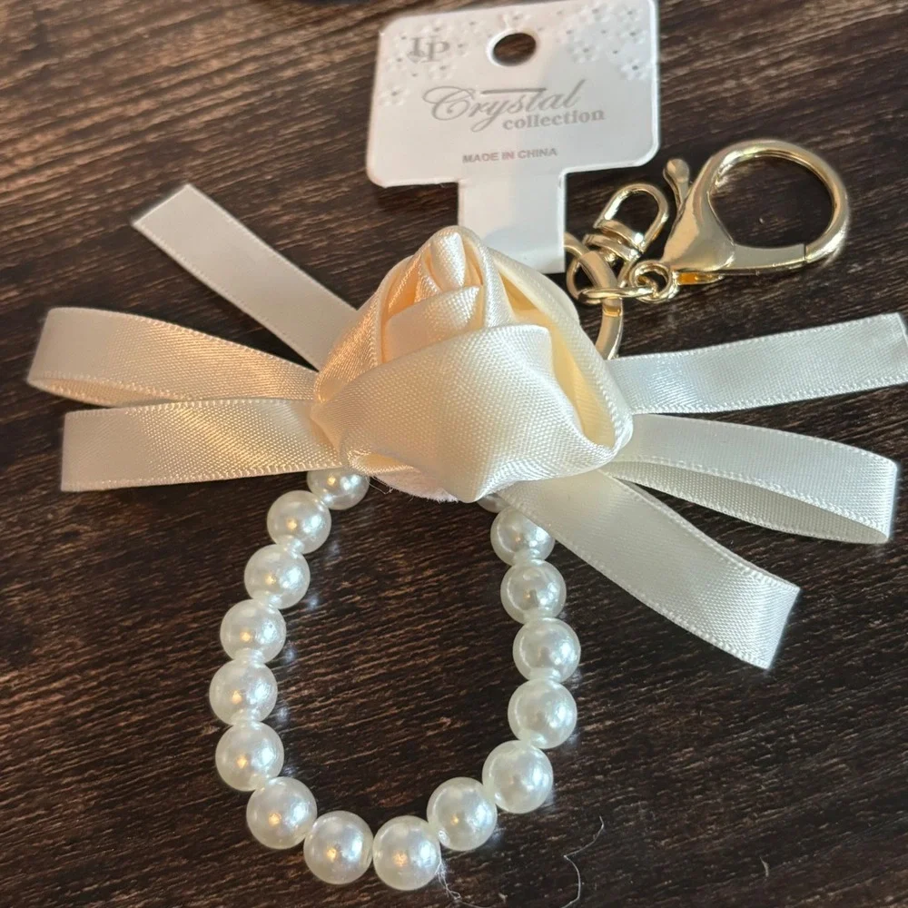 Crystal Collection Ivory Satin Rose Faux Pearl Bow Keychain Gold Tone Clasp